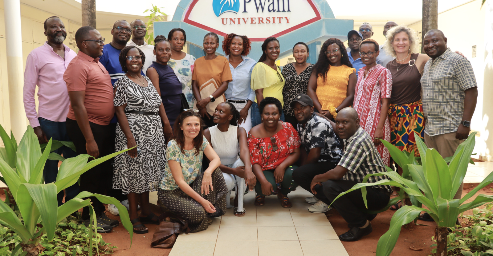 Participants pose for a group photo after completing a five-day Transdisciplinary Research Training.